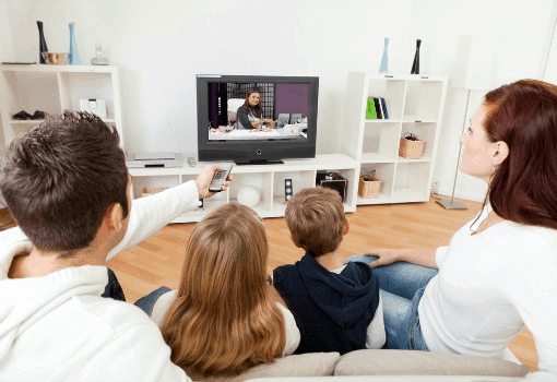 Family Watching TV Together